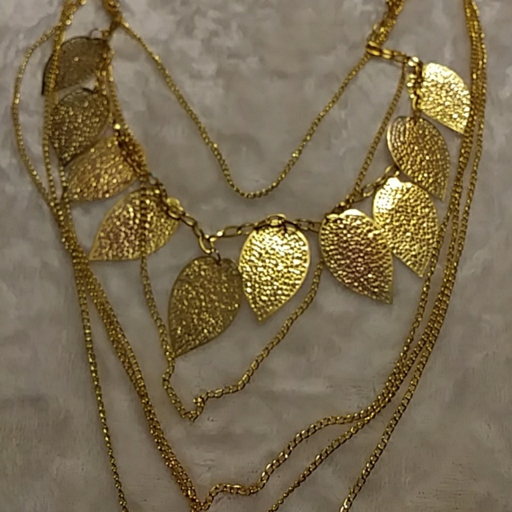 Gold tone necklace.